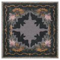 Noli June 'Sue Dabbled in Spellwork' luxury mahjong mat — inky ground with blush and plum blooms and a scalloped edge
