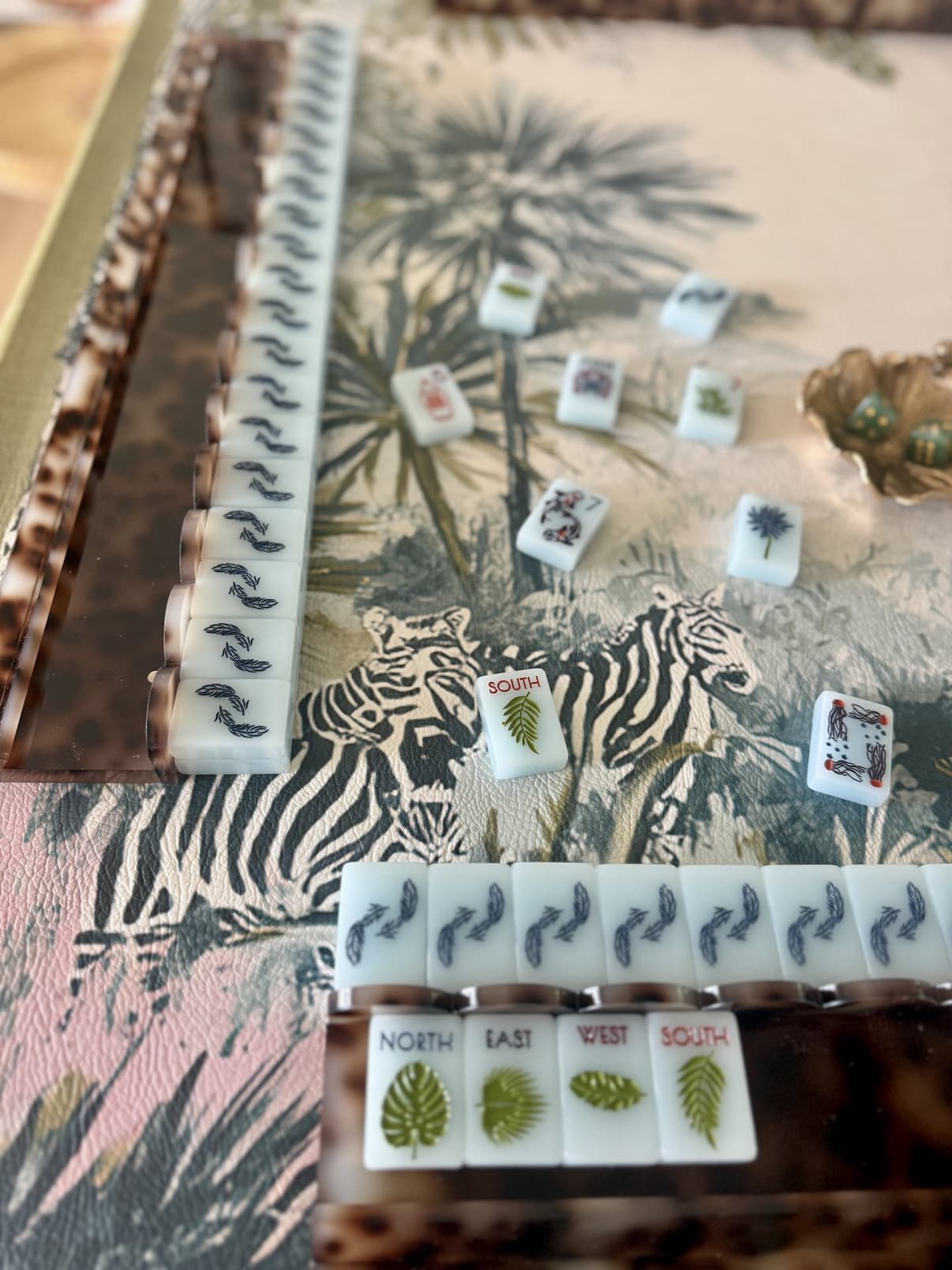 Ruth Stared Down a Lion mahjong mat styled with tiles and animals