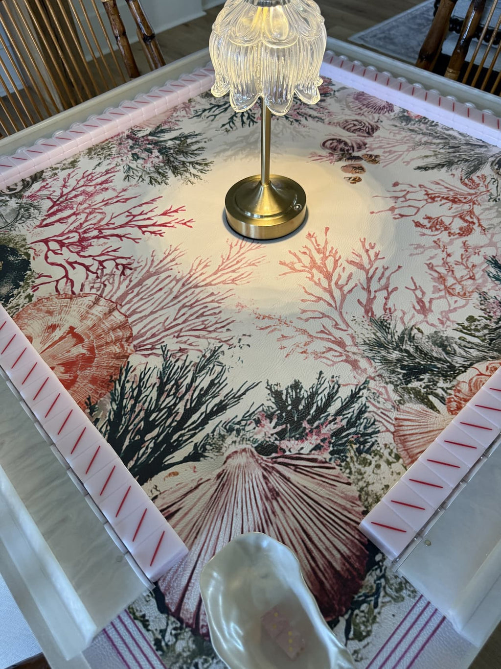 Shirley mahjong mat on table with lamp